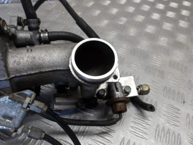 Przepustnica kompletna HONDA VTX 1800 C/R/S 02-04r   PN. 16410-MCH-003
