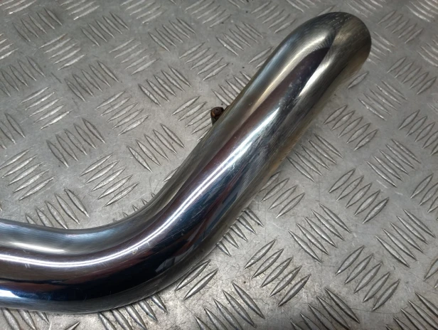 Osłona kolektora wydechu tył HARLEY DAVIDSON SOFTAIL HERITAGE FLSTCI 00-06r   PN. 65702-00A