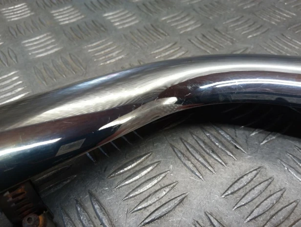 Osłona kolektora wydechu tył HARLEY DAVIDSON SOFTAIL HERITAGE FLSTCI 00-06r   PN. 65702-00A
