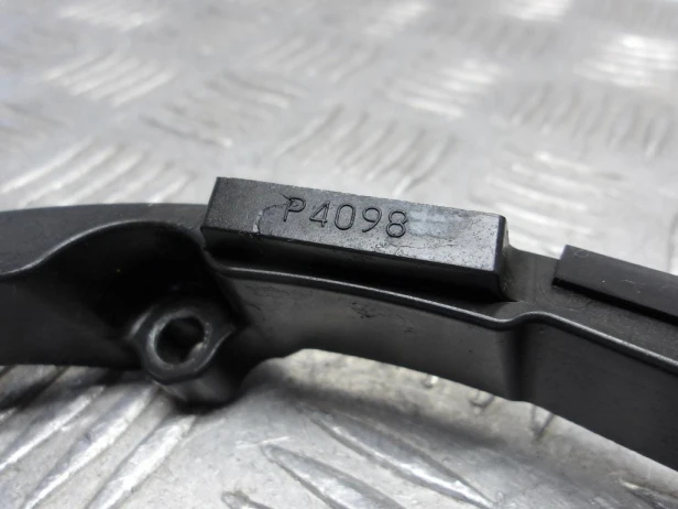 Stelaż mocowanie obudowy lampy KAWASAKI VN 2000 VULCAN 04-09r   PN. 13280-0021