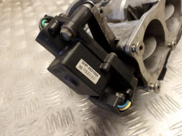 Przepustnica wtryskiwacze KAWASAKI VN 2000 VULCAN 04-10r   PN. 16163-0001