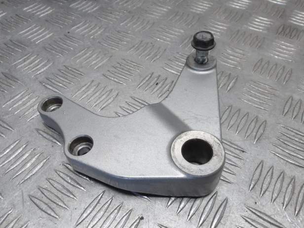 Jarzmo mocowanie zacisku hamulcowego tył KAWASAKI VN 1500 VULCAN NOMAD 2001-2004  PN: 43034-1160