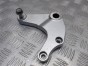 Jarzmo mocowanie zacisku hamulcowego tył KAWASAKI VN 1500 VULCAN NOMAD 2001-2004  PN: 43034-1160