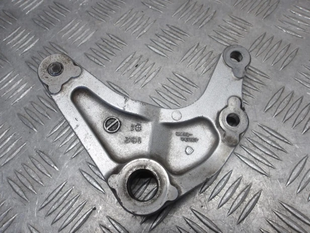 Jarzmo mocowanie zacisku hamulcowego tył KAWASAKI VN 1500 VULCAN NOMAD 2001-2004  PN: 43034-1160
